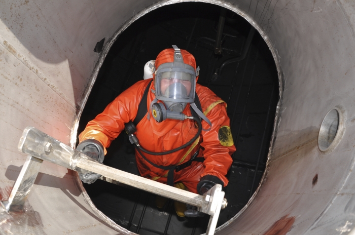 worker with protective suit