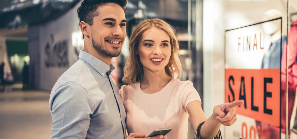 Beautiful couple shopping in store