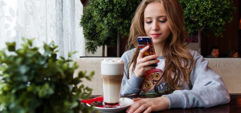 woman holding phone - direct response marketing